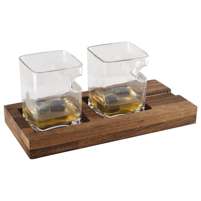 Glass whiskey set with wooden support and stone ice cubes