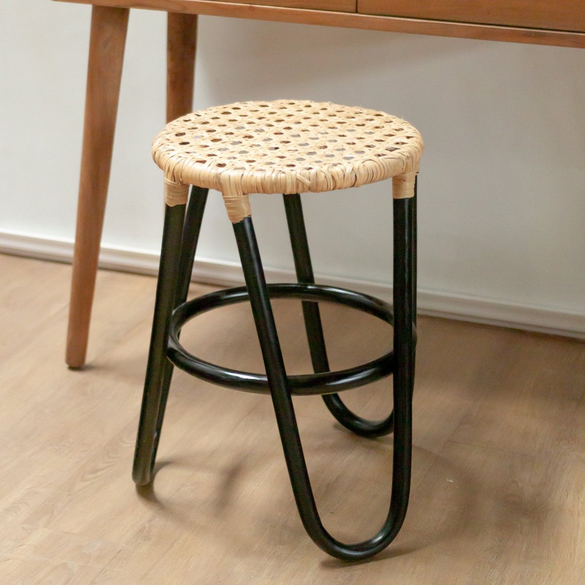 Rattan stool KOLAKA black Ø35 cm - three-legged woven seat