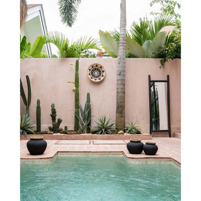 Terracotta vase with raffia, tall - 27 cm