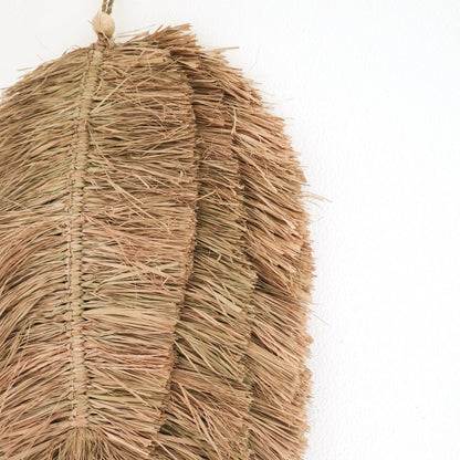 Raffia wall decor 50 cm – leaf-shaped handwoven piece