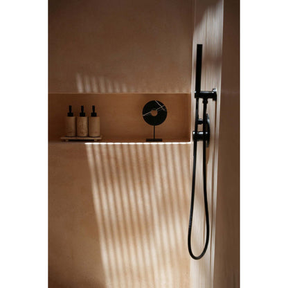 Black marble disc on stand - M