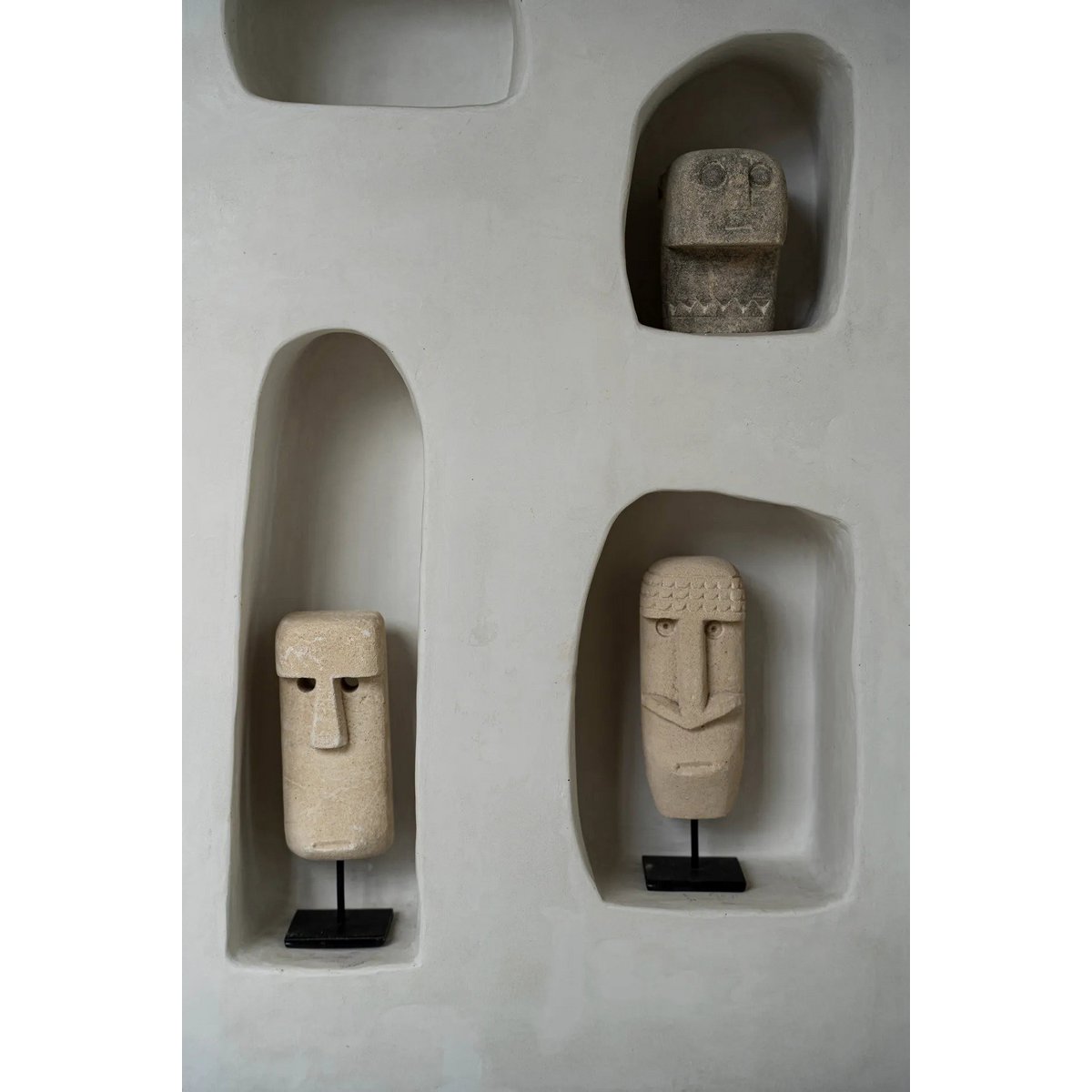 Sumba stone face on stand - hand carved