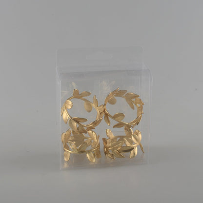 Gold napkin rings, set of 4 - metal leaf design
